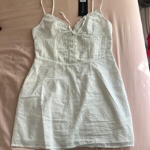 Cute medium white dress from Whitefox!!! “Hard to love minidress”